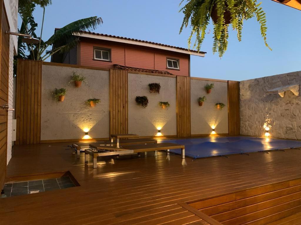 Casa Com Piscina Em Frente A Praia Do Santinho ฟลอเรียนอโปลิส ภายนอก รูปภาพ