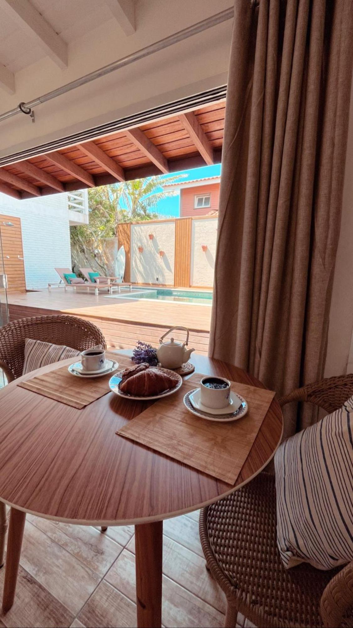 Casa Com Piscina Em Frente A Praia Do Santinho ฟลอเรียนอโปลิส ภายนอก รูปภาพ